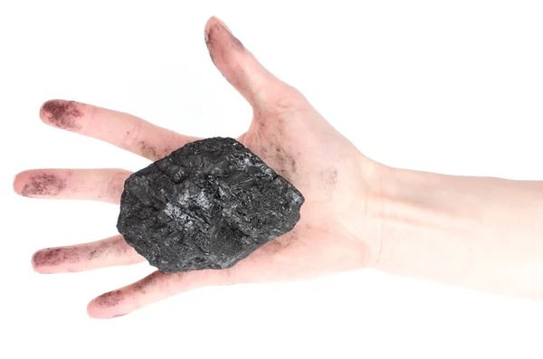 Woman hand holding coal lump on white background — Stock Photo, Image