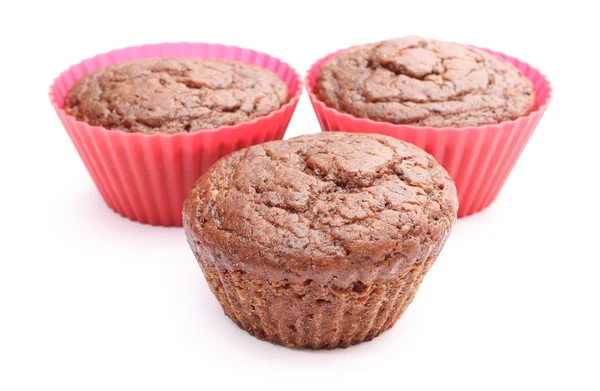 Muffin de chocolate recién horneado en tazas de silicona roja —  Fotos de Stock
