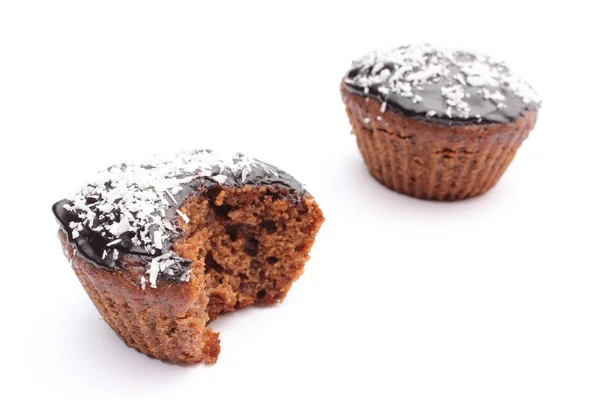 Fresh baked chocolate muffin with desiccated coconut — Stock Photo, Image