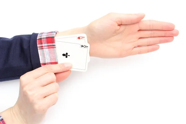 Business woman pulls an aces from his sleeve. White background — Stock Photo, Image