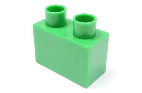 Green building block on white background — Stock Photo, Image