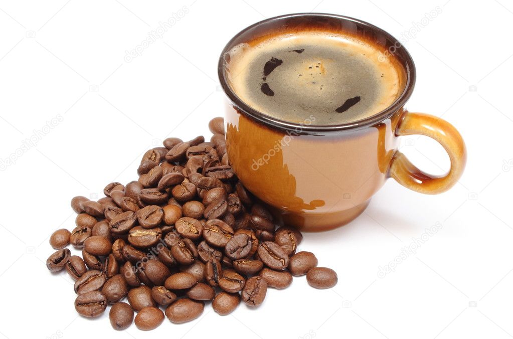 Heap of coffee grains and cup of beverage