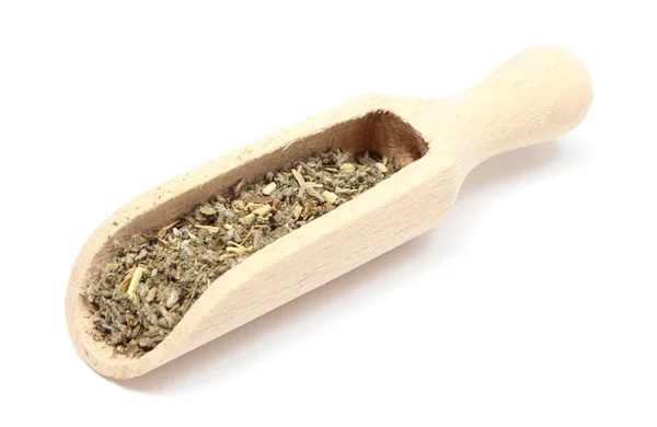 Closeup of dried sage on wooden spoon — Stock Photo, Image