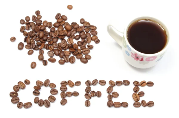 Inscrição café e xícara de bebida em fundo branco — Fotografia de Stock