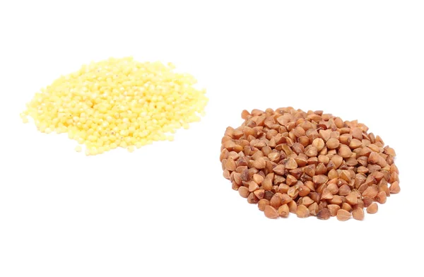 Heap of buckwheat and millet groats on white background — Stock Photo, Image