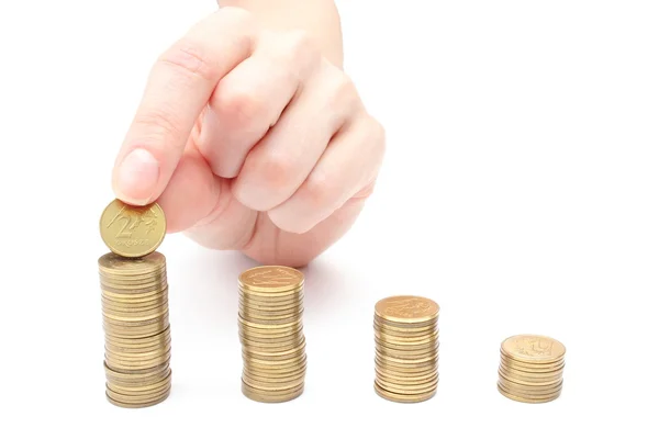 Hand put coins to stack of coins — Stock Photo, Image