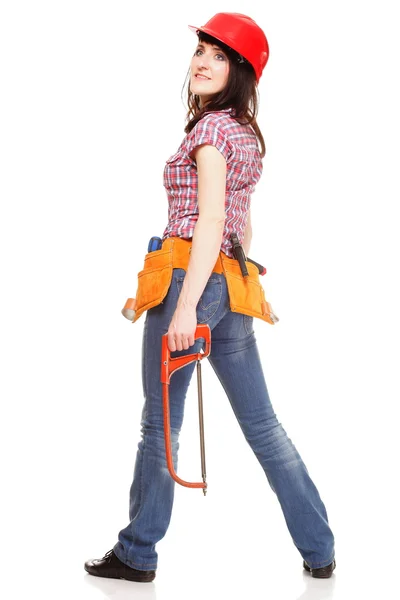 Woman in red helmet holding a saw — Stock Photo, Image