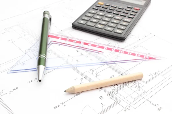 Drawing accesories and calculator on housing plan — Stock Photo, Image