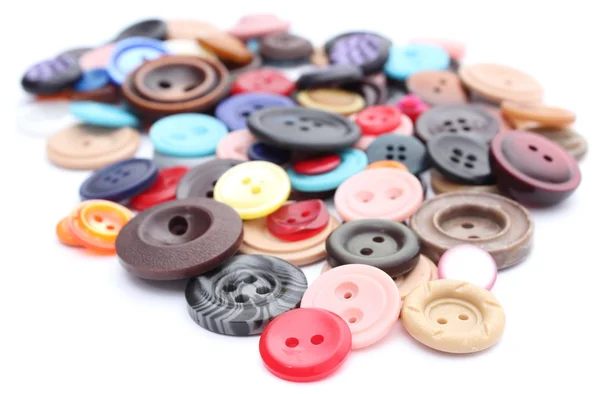 Collection of various sewing buttons on white background — Stock Photo, Image