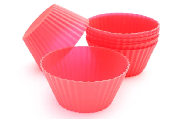 Red silicone cups on white background — Stock Photo, Image