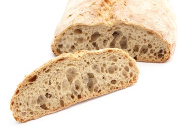 dilim çavdar ekmeği ve ekmek arka planda