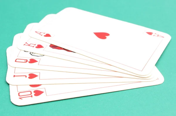 Cartão de jogo em fundo verde — Fotografia de Stock