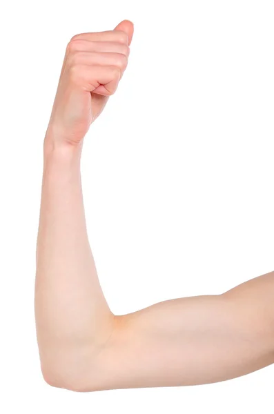 Slanke vrouw toont haar biceps. witte achtergrond — Stockfoto
