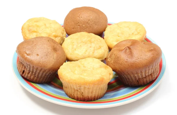 Fresh baked apple and coffee muffins on colorful plate — Stock Photo, Image