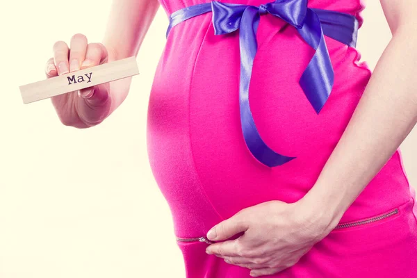 Woman Pregnant Wearing Pink Dress Blue Ribbon Showing Word May — Stock Photo, Image