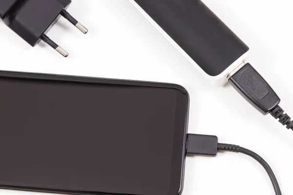 External Black Powerbank Electric Charger Charging Empty Battery Smartphone Mobile — Stock Photo, Image