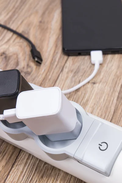 Smartphone Mobile Phone Chargers Connected Electrical Power Strip Various Devices — Fotografia de Stock