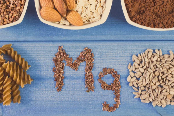 Yazı, magnezyum, vitamin ve mineral içeren MG ve malzemeler. Sağlıklı beslenme