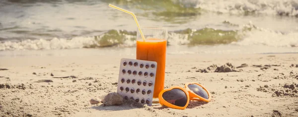 Vintage Photo Medical Pills Carrot Juice Sunglasses Sand Beach Concept — Stock Photo, Image