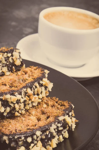 Fresh baked pastry made of zucchini and cup of coffee. Delicious dessert