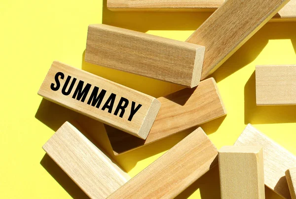 Summary Text Written One Many Scattered Wooden Blocks Yellow Background — Stock Photo, Image