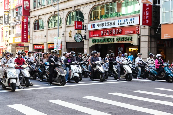 Scooter Riders During Morning Commute in Taipei, Taiwan