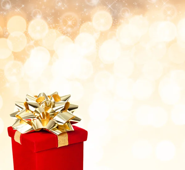 Red Gift Box on Glittering Background — Stock Photo, Image