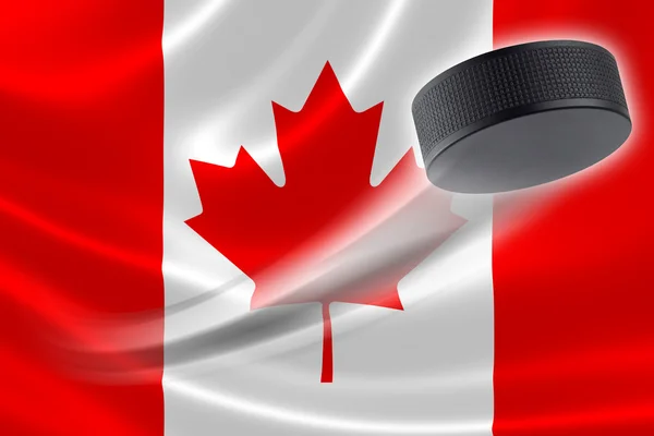 Hockey Puck Streaks a través de la bandera canadiense — Foto de Stock