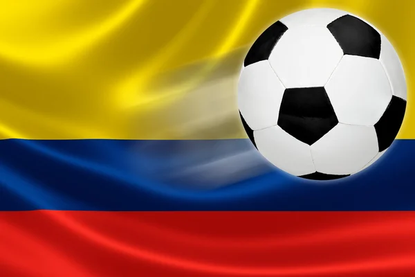 Le ballon de football sort du drapeau colombien — Photo