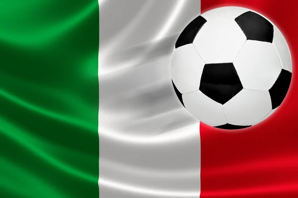 Fußball springt aus italienischer Flagge — Stockfoto