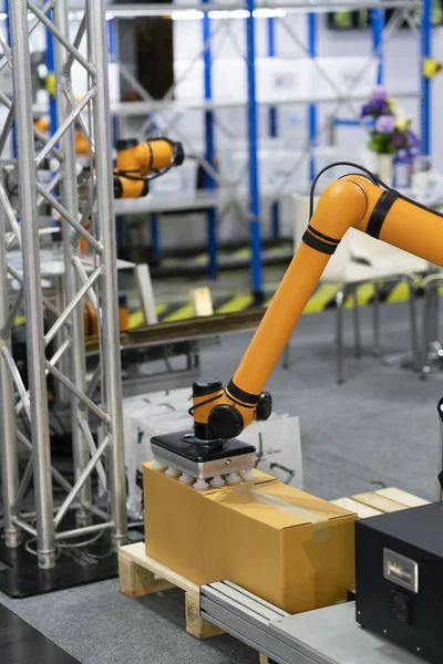 High-tech manufacturing process with robot programming arm in automation system