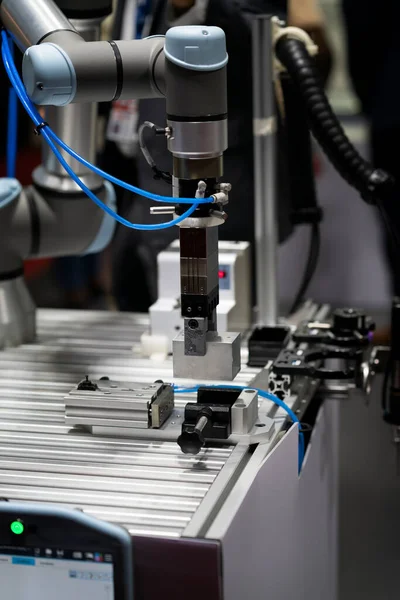 High-tech manufacturing process with robot programming arm in automation system