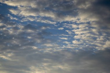 Sunset sky, dark gloomy thunderclouds.
