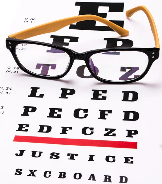 Glasses and eye chart — Stock Photo, Image