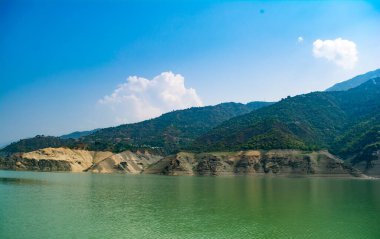 Tehri lake in Uttarakhand, india, Tehri Lake is an artificial dam reservoir. Tehri Dam, the tallest dam in India and Tehri dam is Asia's largest man-made lake. clipart
