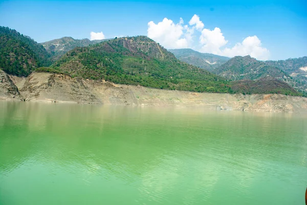 Tehri lake in Uttarakhand, india, Tehri Lake is an artificial dam reservoir. Tehri Dam, the tallest dam in India and Tehri dam is Asia\'s largest man-made lake.