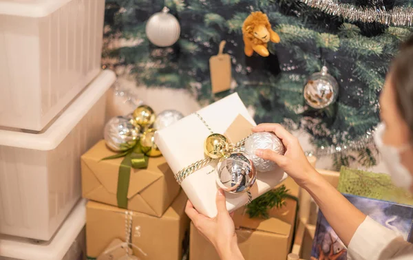 Female Hands Holding Christmas Gift Box Gold Silver Ball Christmas — Stock Photo, Image