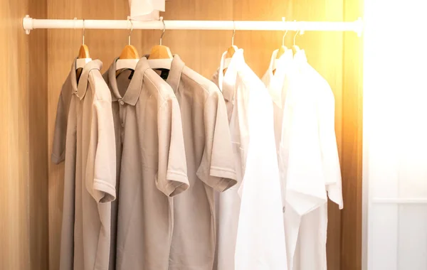 Close Collection Shade Earth Tone Color Shirts Hanging Wooden Clothes — Foto de Stock