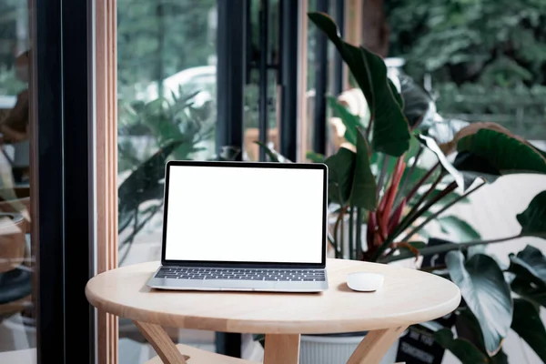 Business concept : White notebook screen background to put advertising text selling marketing products in the coffee shop, mock up, sales and text.