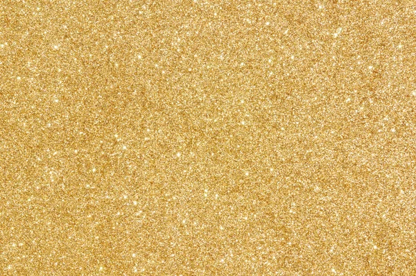 Gouden glitter textuur achtergrond — Stockfoto