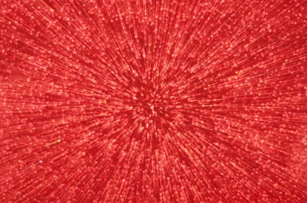 Piros csillogó robbanás fények absztrakt háttér — Stock Fotó