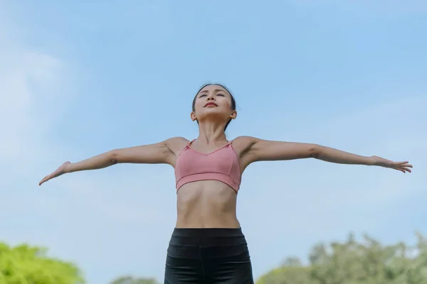 Sporty Young Asian Woman Doing Stretching Exercise Outdoors Park Sport — стоковое фото