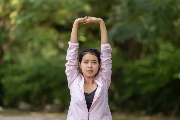 Sporty Young Asian Woman Doing Stretching Exercise Outdoors Park Sport — стоковое фото