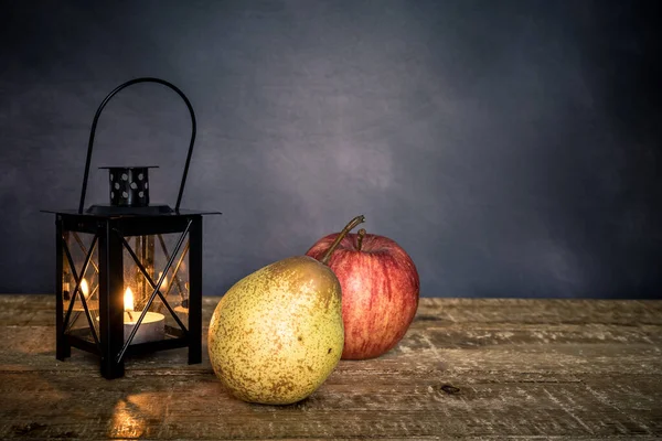 Pear Apple Illuminated Lantern Isolated Dark Background Healthy Eating Concept — стоковое фото