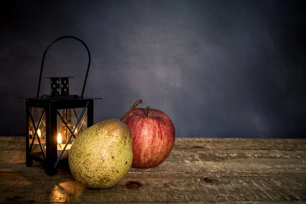 Pear Apple Illuminated Lantern Isolated Dark Background Healthy Eating Concept — стоковое фото