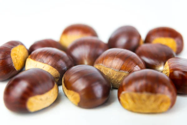 Ripe Chestnuts Freshly Picked Removed Hedgehog Arranged White Wooden Surface — Stock Photo, Image