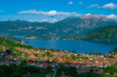 The panorama of Lake Como photographed from the town of Colonno, showing the Northern Grigna, the Southern Grigna, Bellagio, and the town of Colonno.