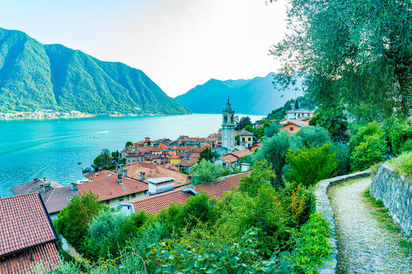The town of Colonno, on Lake Como, and a section of the Greenway, photographed in summer.