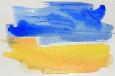 Ukrayna 'nın suluboya bayrağı. Sarı ve mavi renkler. Ülkenin ulusal sembolü. Elle boyanmış renkli dokunuşlar ve suluboya kağıt üzerinde bir fırça. Şık bir pankart ya da arka plan. UA.