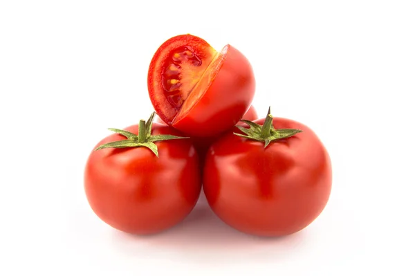 Quatro tomates fatiados — Fotografia de Stock